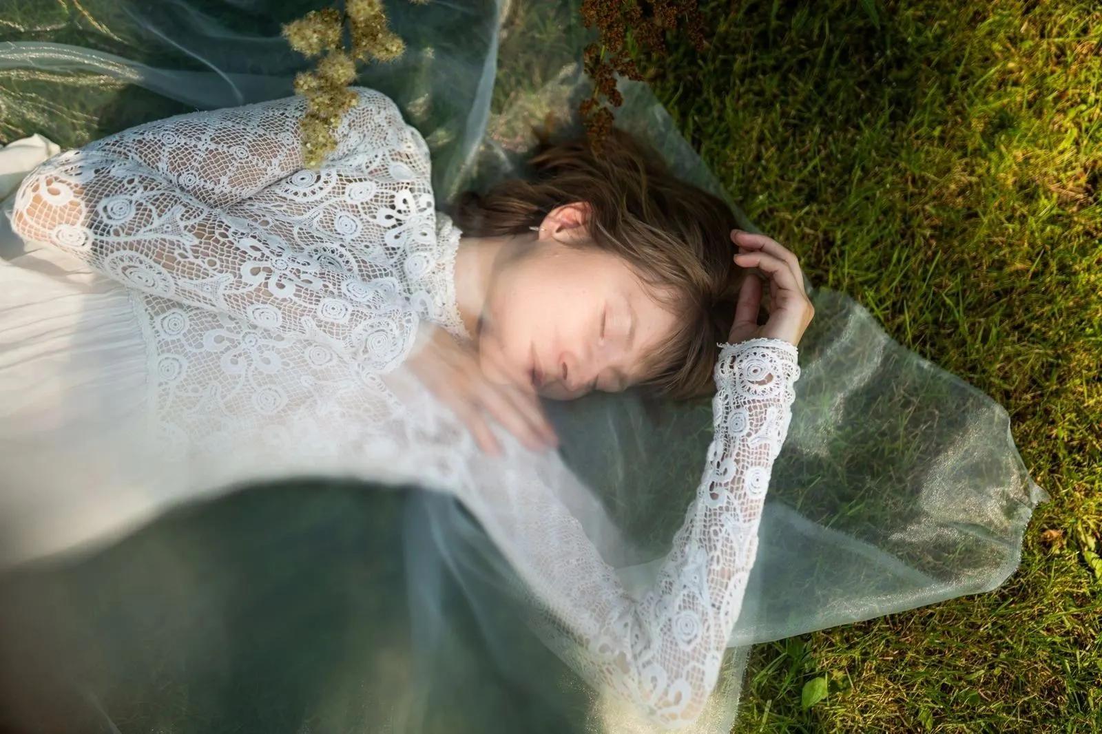 Sasha Bartashevich lying in the grass